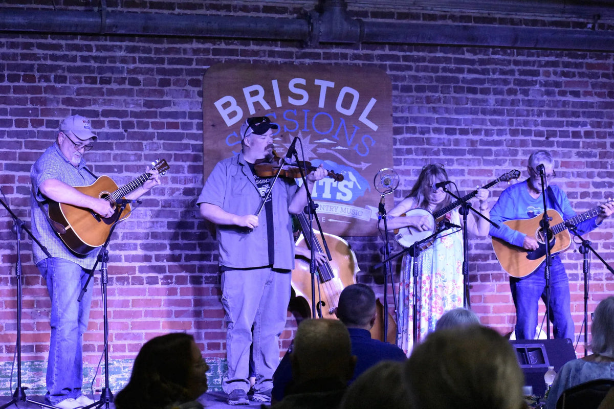 The Whitetop Mountain Band playing fiddle, guitars, banjo and upright bass for a seated crowd at Bristol Sessions Nights: The Carter Sessions, Bristol Listening Room, L.C. King Building, Bristol, Tennessee