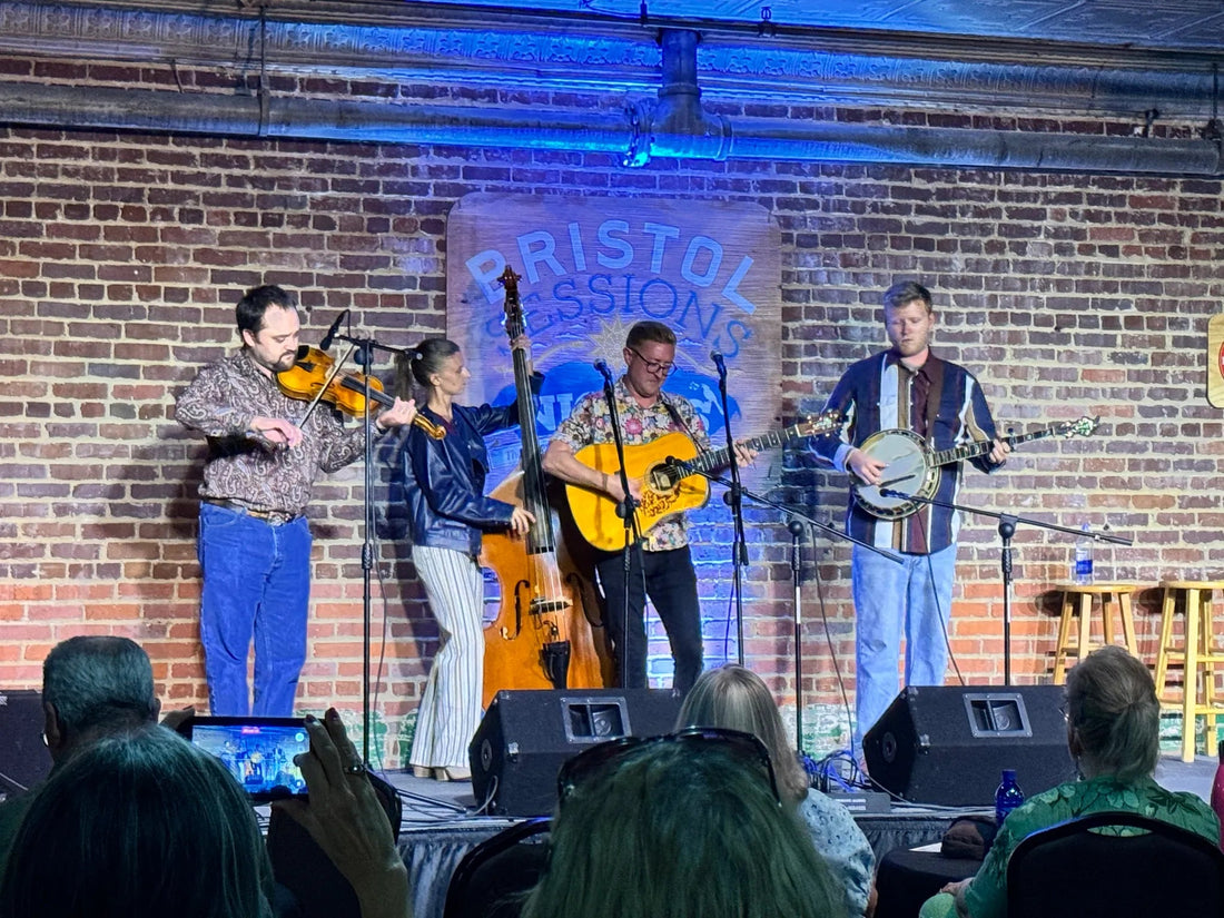 Alex Leach and his band play fiddle, upright bass, guitar and banjo as guests film from their seats at Bristol Sessions Nights: Mountain Songs, Bristol Listening Room, L.C. King Building, Bristol, Tennessee
