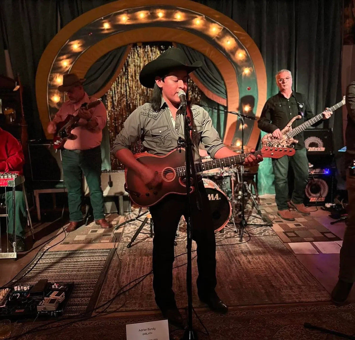 Adrian Bundy singing on stage with his band, performer at Bristol Sessions Nights in Bristol, Tennessee