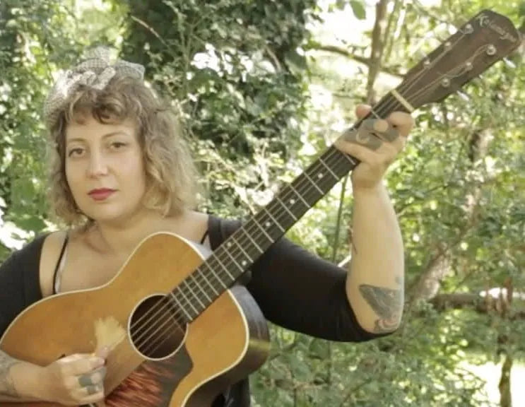 Ali Kafka with her acoustic guitar, performer at Bristol Sessions Nights: The Blue Yodel in Bristol, Tennessee