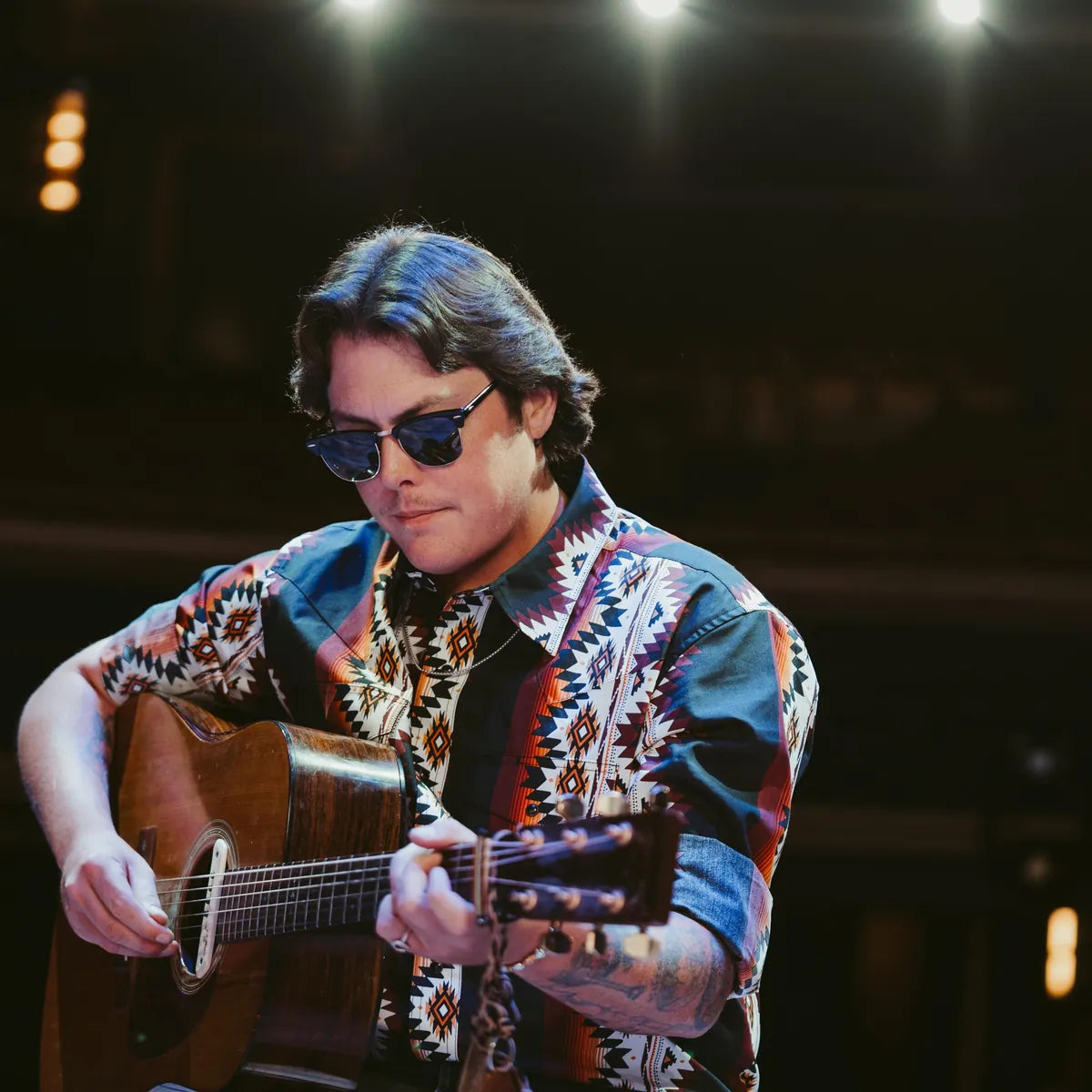 Chance Lawson playing acoustic guitar, performer at Bristol Sessions Nights in Bristol, Tennessee