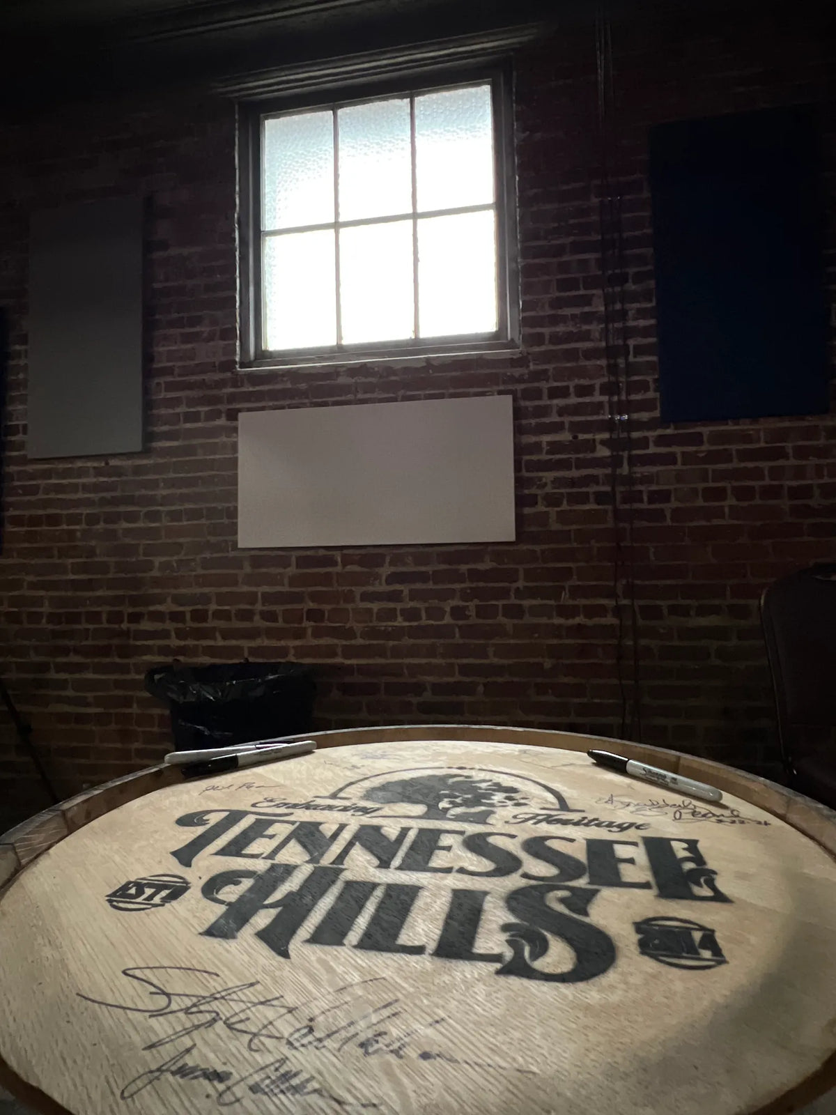 A signed Tennessee Hills Distillery barrel head on display at Bristol Sessions Nights: The First Take, Bristol Listening Room, L.C. King Building, Bristol, Tennessee