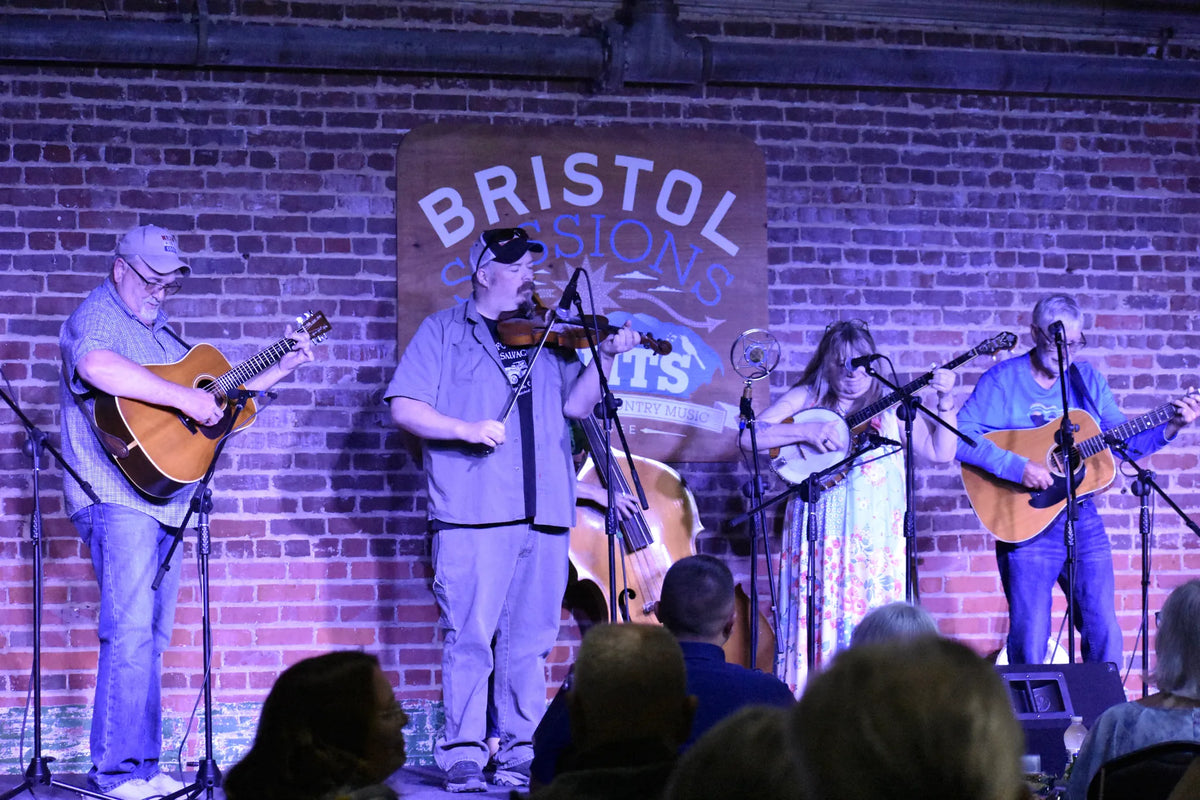 Whitetop Mountain Band playing fiddle, guitars, banjo and upright bass for a seated crowd at Bristol Sessions Nights: The Carter Sessions, Bristol Listening Room, L.C. King Building, Bristol, Tennessee