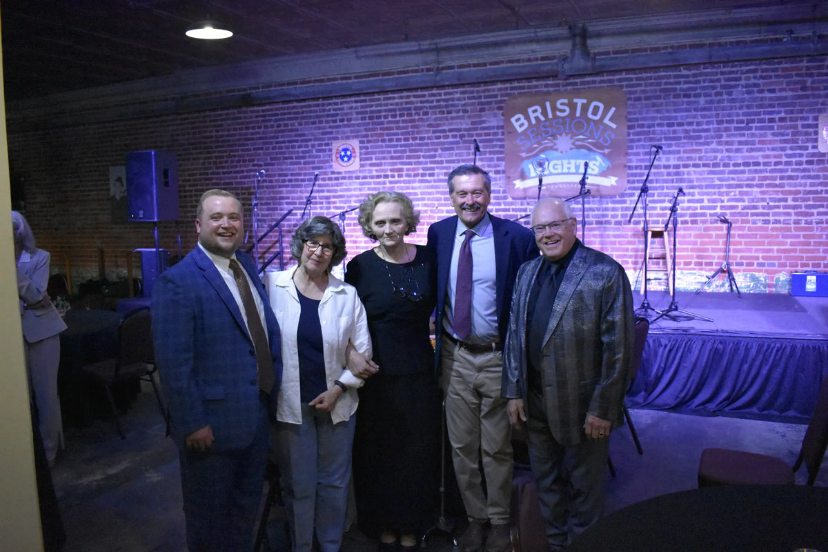 Guests and hosts pose together in front of the stage at Bristol Sessions Nights: The Carter Sessions, Bristol Listening Room, L.C. King Building, Bristol, Tennessee