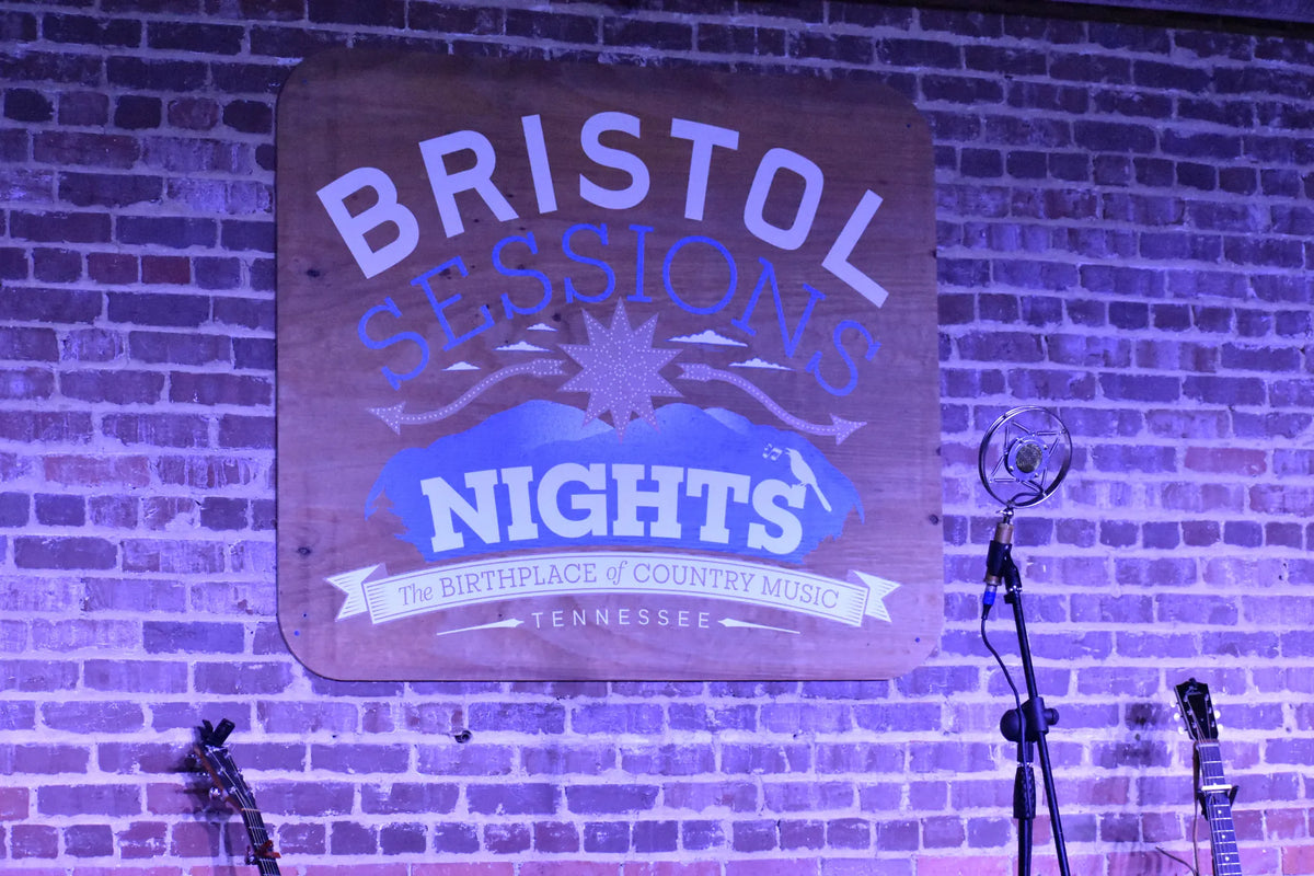 The Bristol Sessions Nights sign on the brick stage wall at Bristol Sessions Nights: The Carter Sessions, Bristol Listening Room, L.C. King Building, Bristol, Tennessee