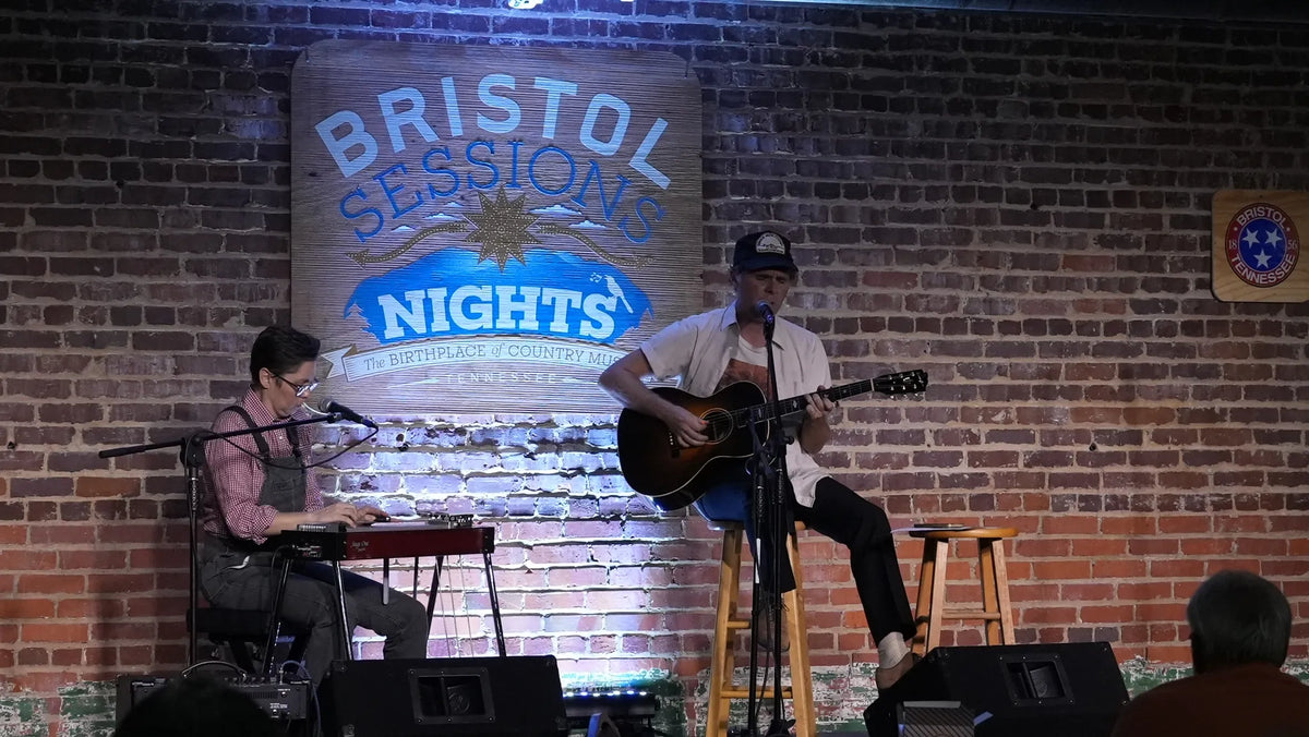 Kris Truelsen playing acoustic guitar alongside a keyboard player at Bristol Sessions Nights: The Blue Yodel, Bristol Listening Room, L.C. King Building, Bristol, Tennessee