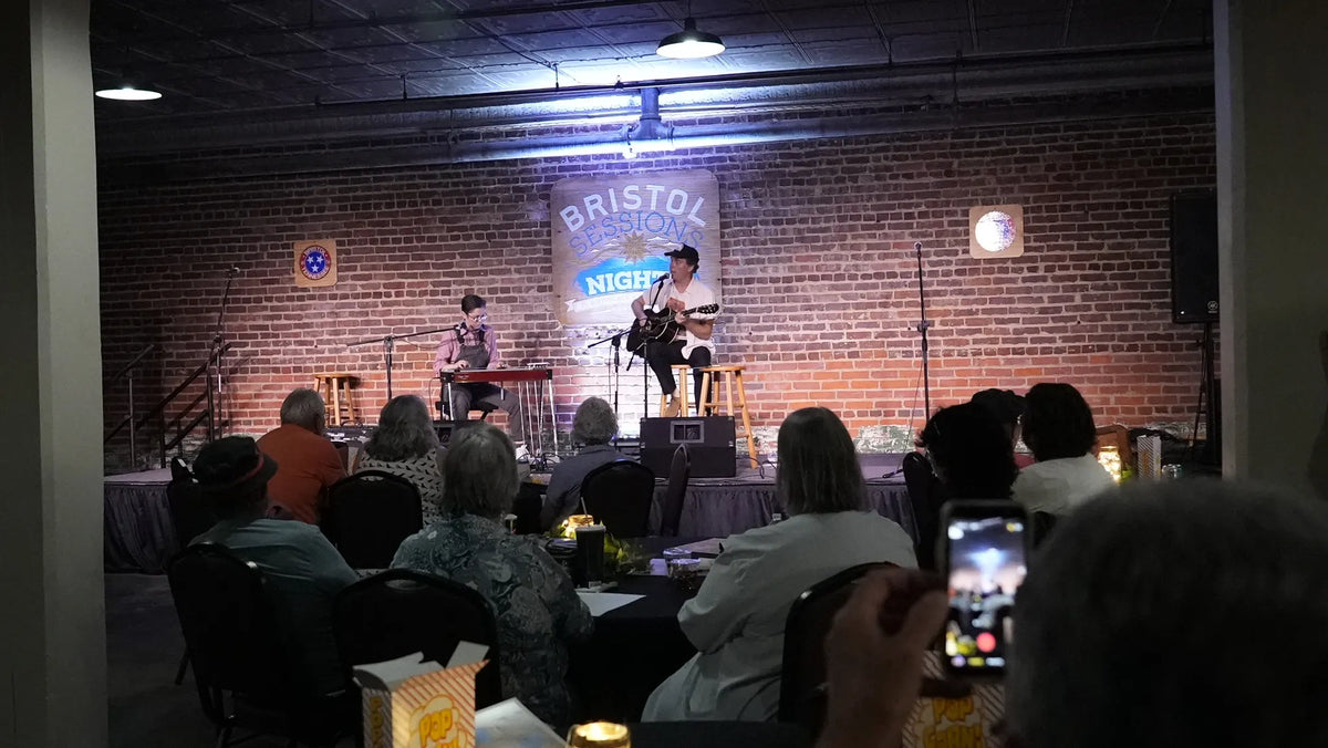 A listening room crowd watches a duo perform from the back of the room at Bristol Sessions Nights: The Blue Yodel, Bristol Listening Room, L.C. King Building, Bristol, Tennessee