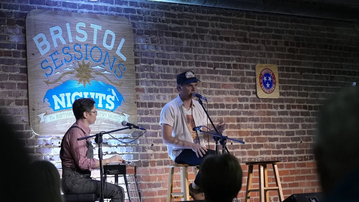Kris Truelsen singing beside a keyboard player at Bristol Sessions Nights: The Blue Yodel, Bristol Listening Room, L.C. King Building, Bristol, Tennessee