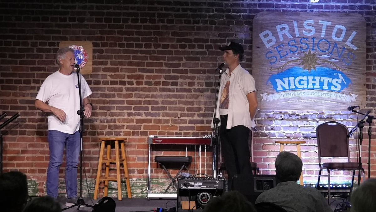 Kris Truelsen and a guest share a conversation on stage at Bristol Sessions Nights: The Blue Yodel, Bristol Listening Room, L.C. King Building, Bristol, Tennessee