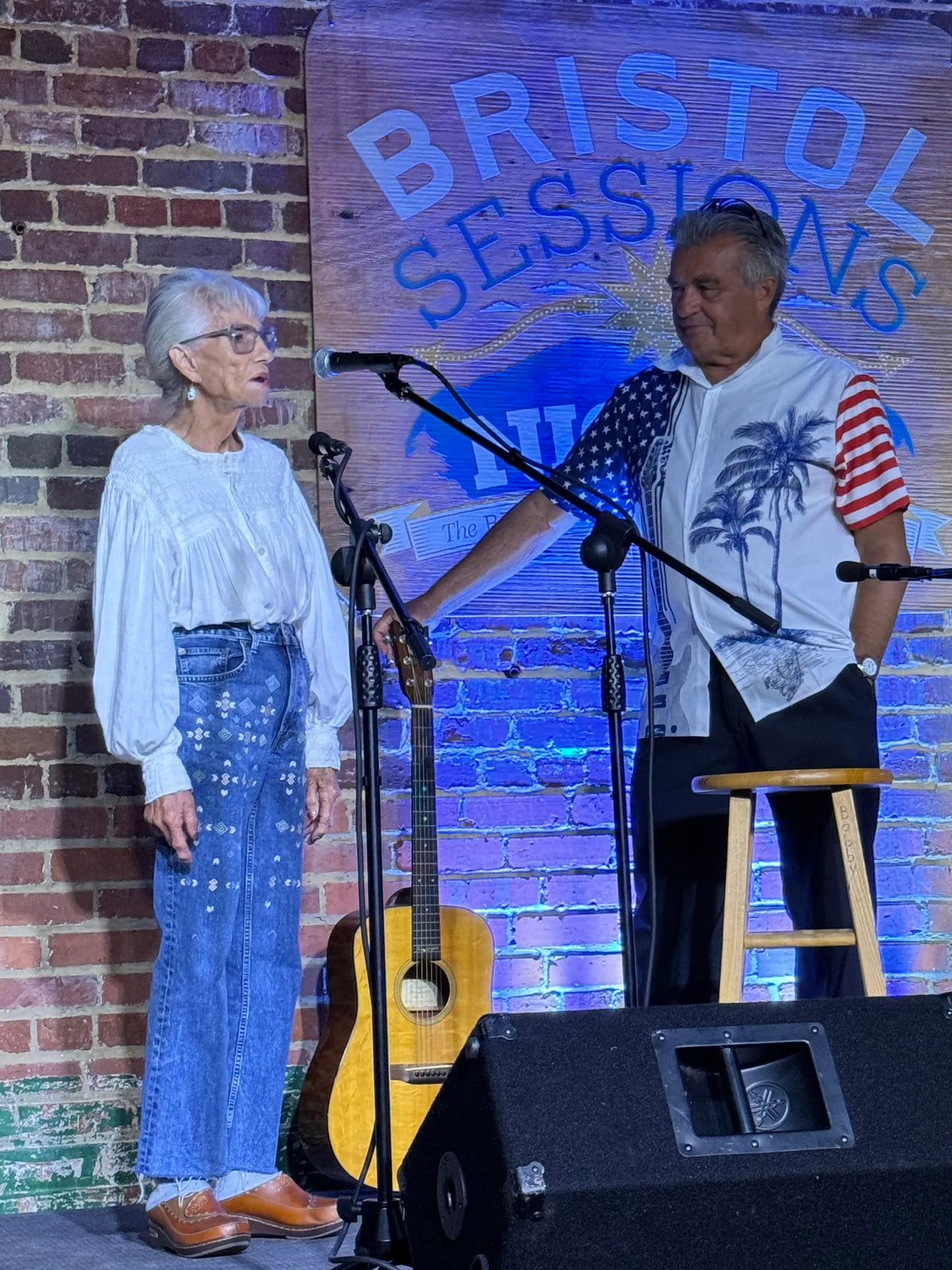 Tim White and a guest share a moment on stage at Bristol Sessions Nights: Mountain Songs, Bristol Listening Room, L.C. King Building, Bristol, Tennessee