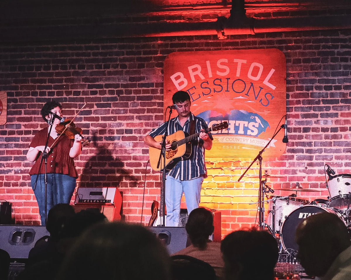 Ryder Casey and a fiddler perform as the audience listens at Bristol Sessions Nights: A True Taste of Tennessee, Bristol Listening Room, L.C. King Building, Bristol, Tennessee