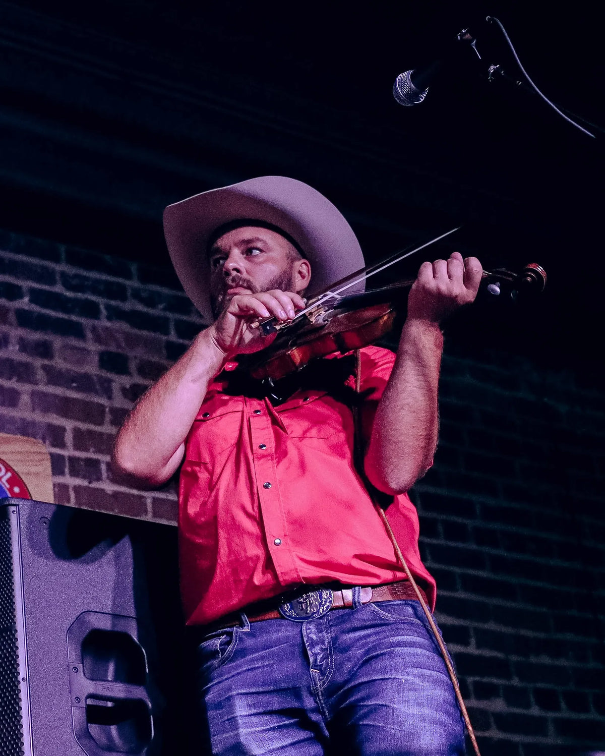 A fiddler in a cowboy hat plays with eyes closed at Bristol Sessions Nights: A True Taste of Tennessee, Bristol Listening Room, L.C. King Building, Bristol, Tennessee